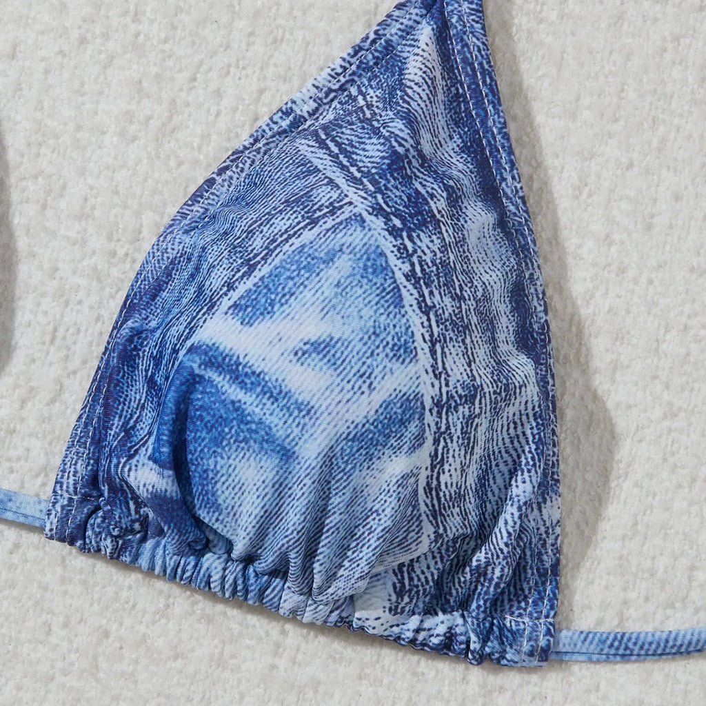 Women's denim blue printed bikini set with strap design, showing front and back views