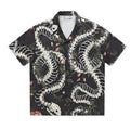 Original snake bone and flower pattern printed on a loose-fit, short sleeve Cuban collar shirt in various colours.