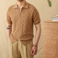 White cotton cardigan with zipper front and lapel collar showing short sleeve design