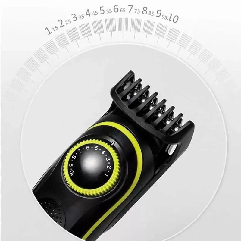 Black KM-696 rechargeable electric hair clipper set with stainless steel blade and cleaning accessories.