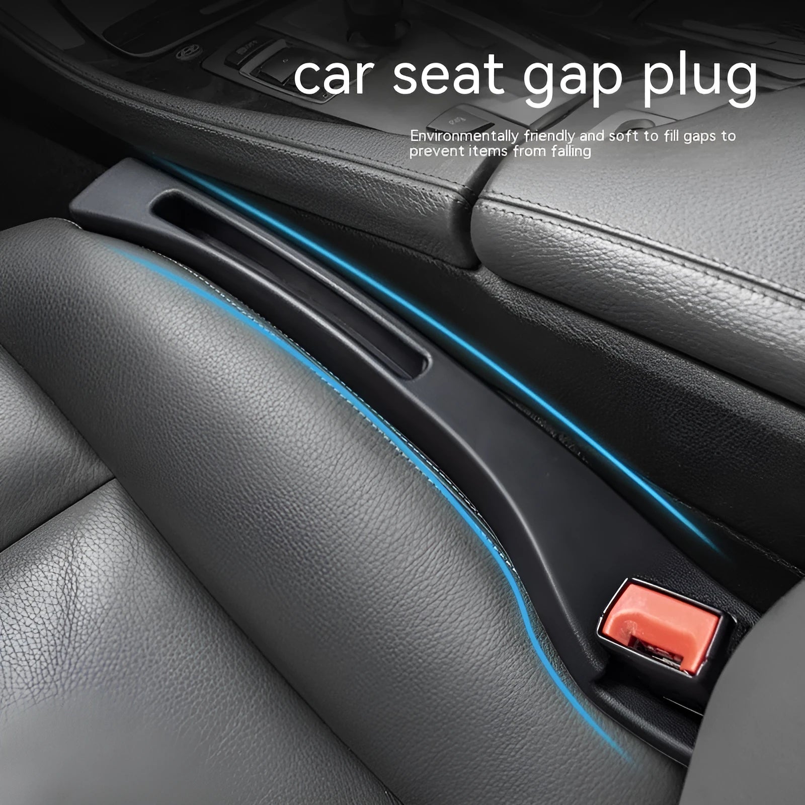 Black plastic car seat gap storage box with handle inserted between car seats.