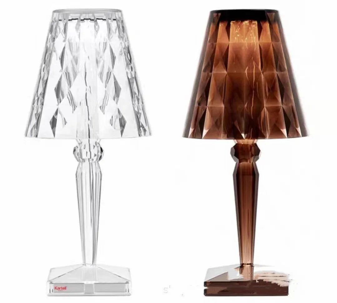 Rose gold portable touch control night light on a table.