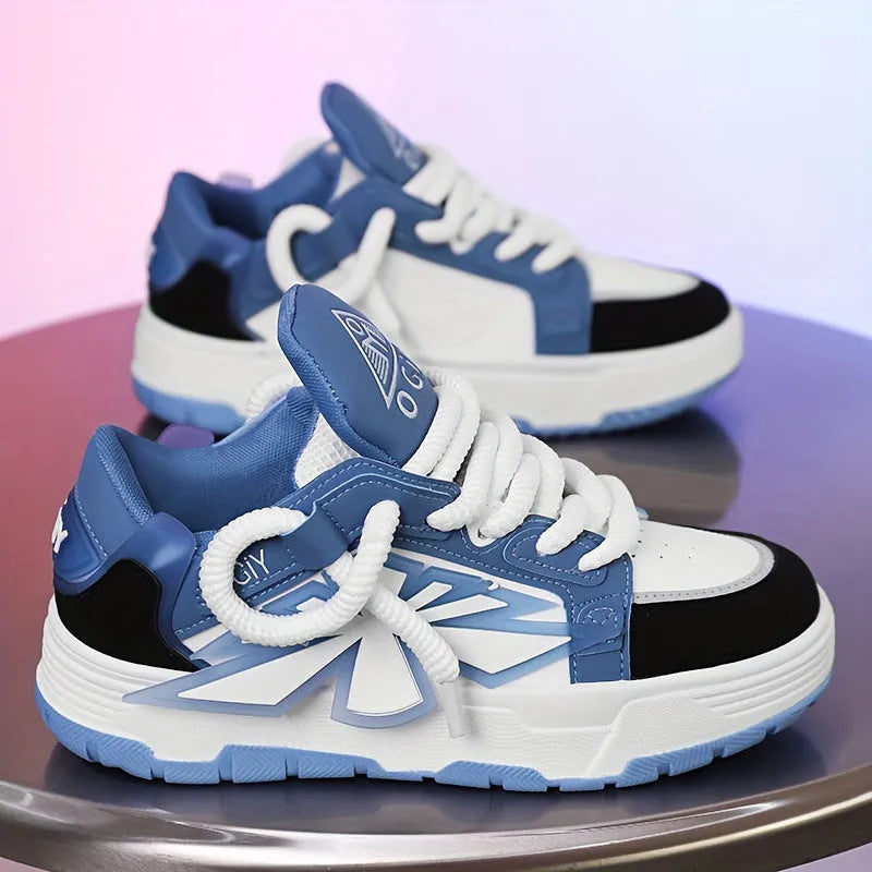 Men's white clunky sneakers with cartoon pattern, synthetic leather upper, rubber sole, and lace-up front.