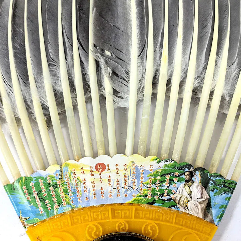 Handmade Chinese craft fan with goose feather and integrated lens fan, graphic colour pattern