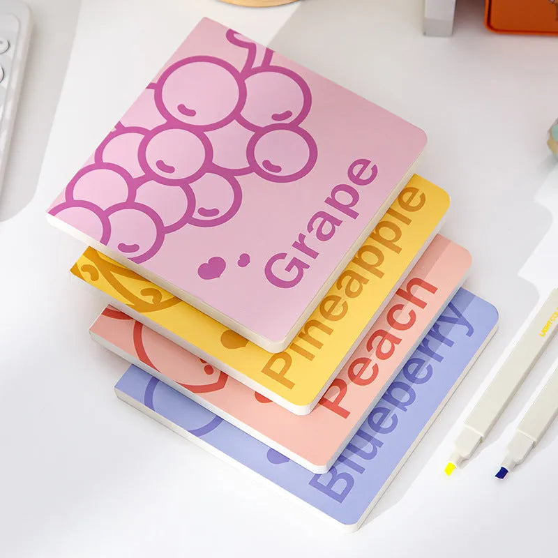 Square fruit-themed notebook with colour embossed cover, shown with 80g thickened paper pages.
