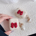 Beige red bow shell TPU earphone case for AirPods with clamshell closure