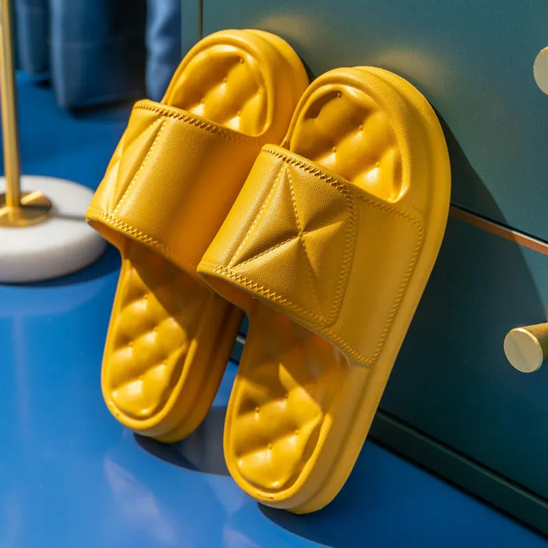 A pair of soft EVA bathroom slippers with a non-slip sole, shown in a selected colour.