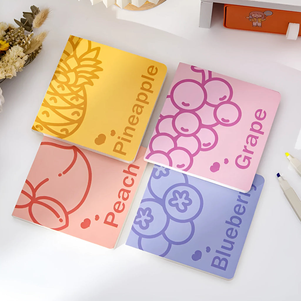Square fruit-themed notebook with colour embossed cover, shown with 80g thickened paper pages.