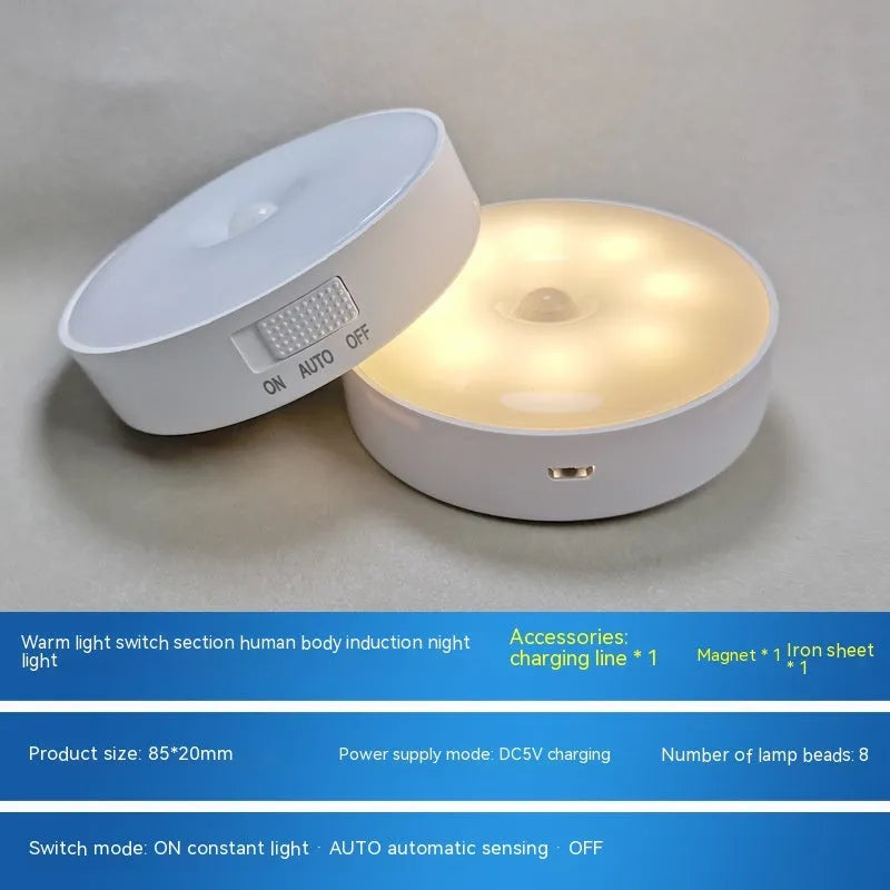Small round motion sensing LED night light with USB charging port in beige colour
