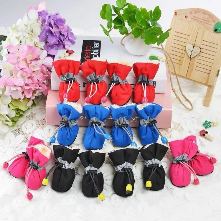 Set of four cloth dog shoes with soft soles in various colour options including fleece-lined variants