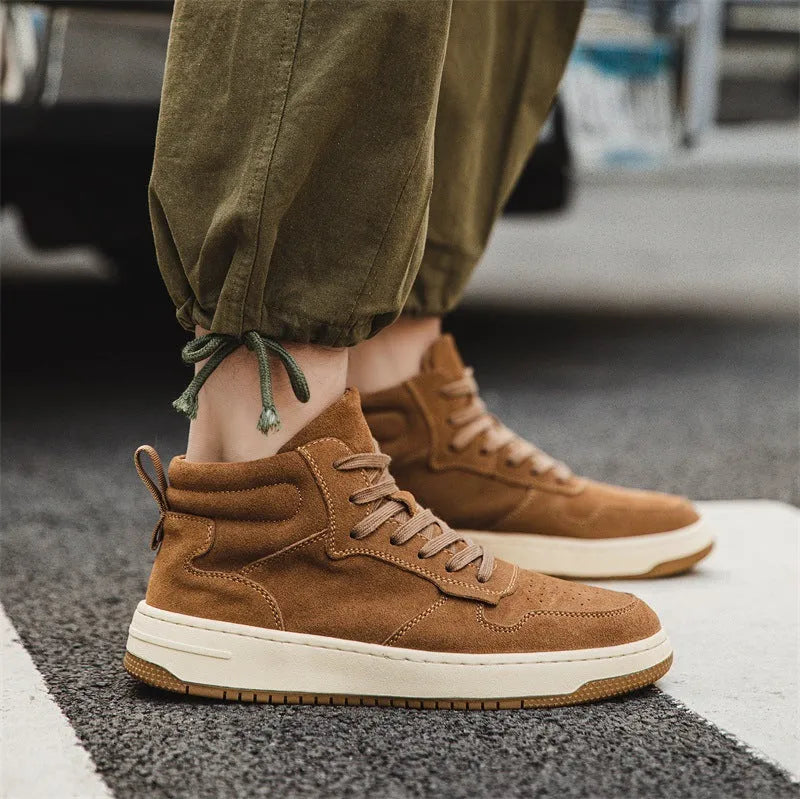 Men's retro workwear mid-top Martin boots in brown cowhide with lace-up closure and flat heel on neutral background