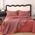Cotton gauze bedding three-piece set showing botanical flower pattern on blanket and matching pillowcases
