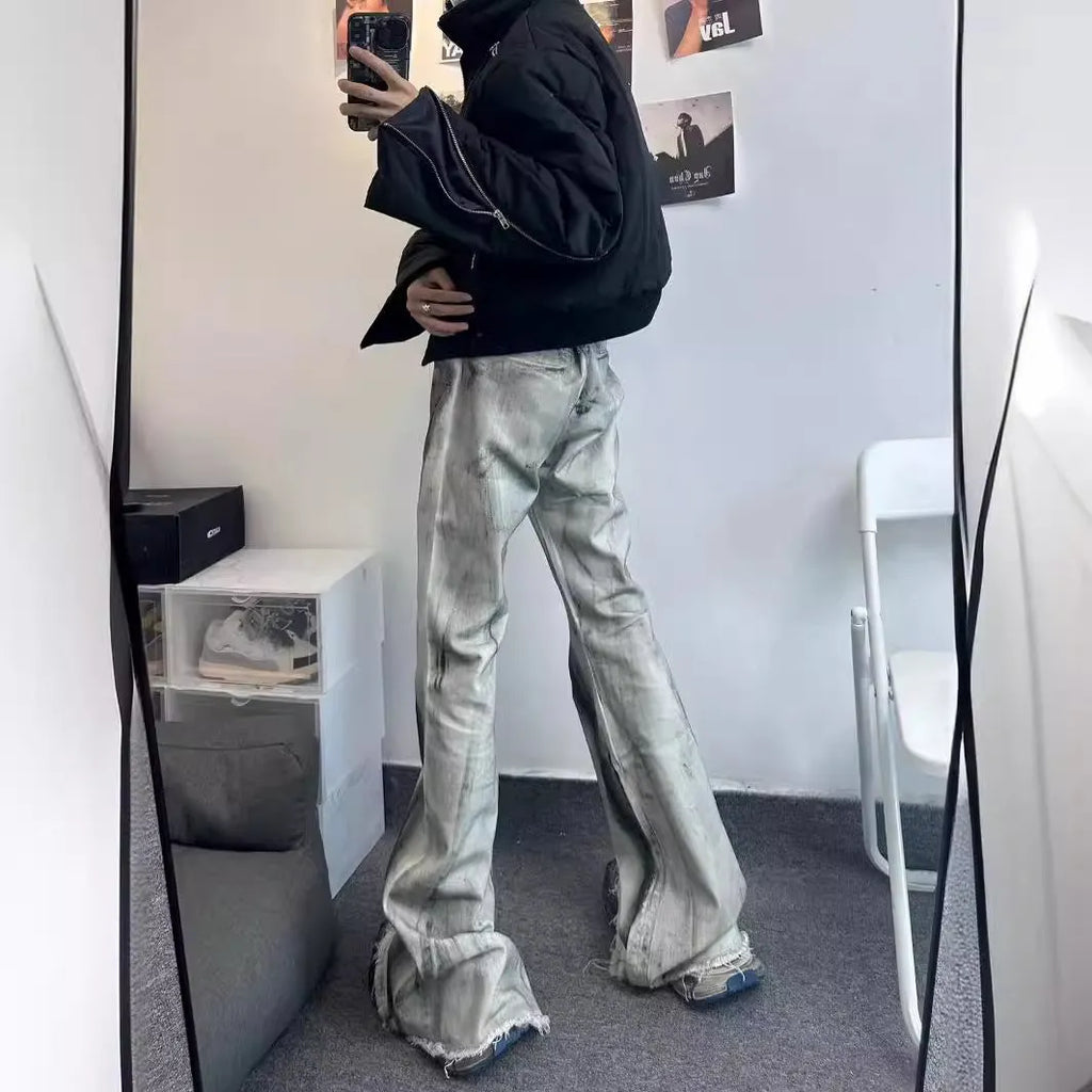 White heavy rough selvedge denim jeans with a black ribbon gradient detail on the leg.