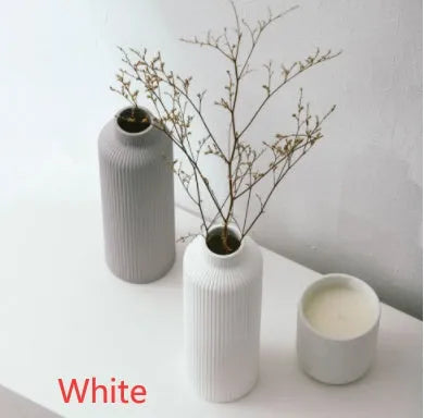 Ceramic vase in European style, grey colour, 22.7cm tall on a shelf