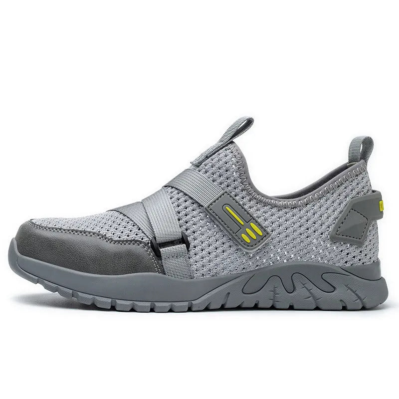 Men's grey safety shoes with steel toe caps, rubber soles, and flying woven upper construction