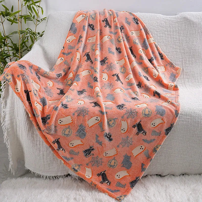 Cartoon patterned flannel blanket showing two size options for use as a child's blanket or air conditioner cover.