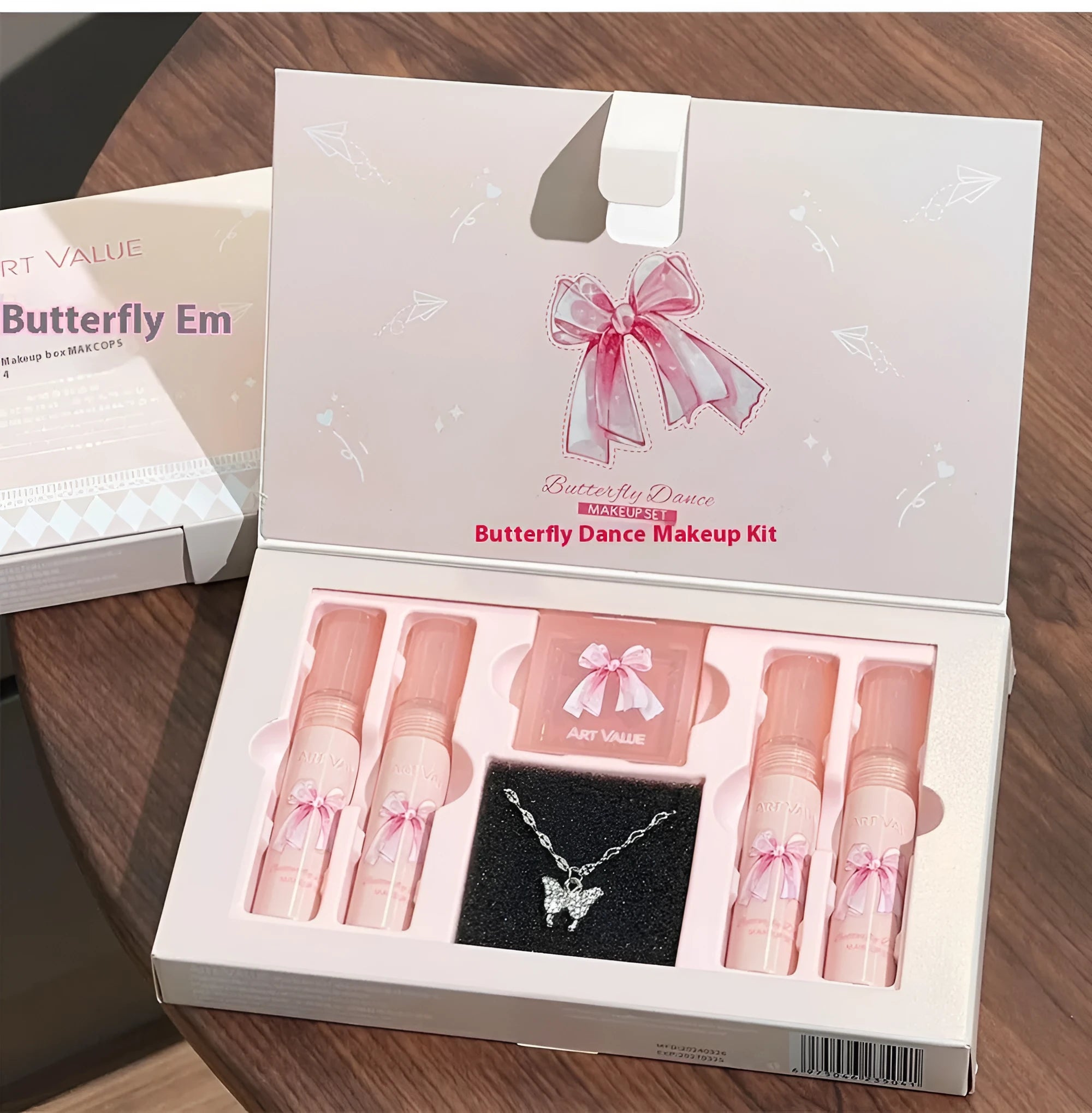 Butterfly Box makeup set with four pink lip mud containers, powder blusher, and necklace