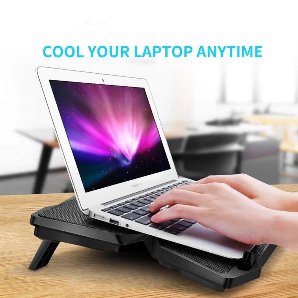 Blue computer cooling base with four LED fans and two USB ports for desktop cooling