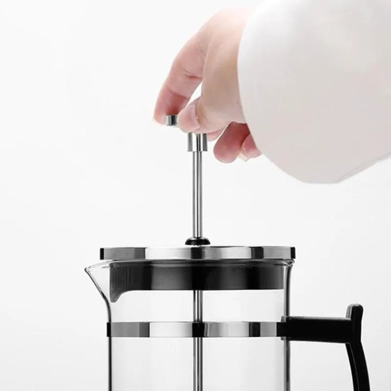 350ml manual French press coffee maker with glass carafe and stainless steel plunger, measuring 10cm by 8cm by 17cm.