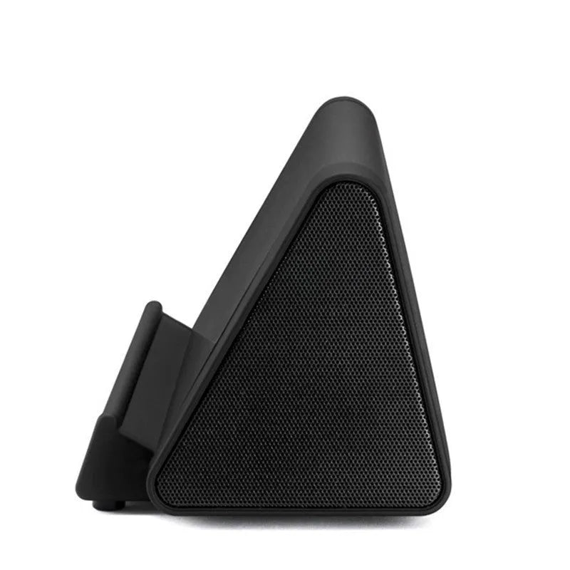 Black and white wireless Bluetooth mini speaker with rechargeable battery and playback controls