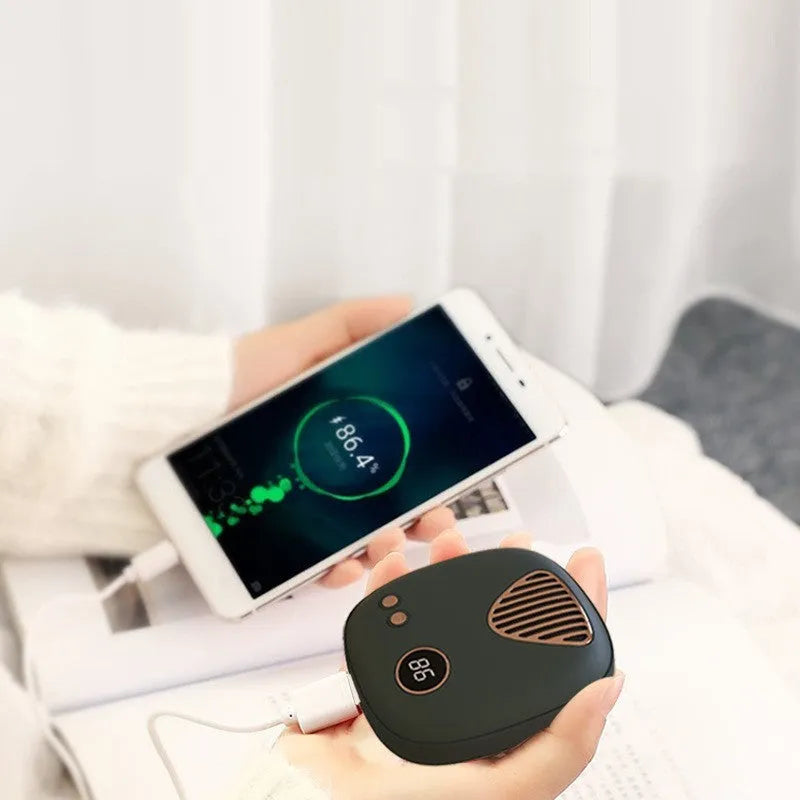 Mini hand warmer in green with USB charging port and modern simple design, 5000mAh capacity