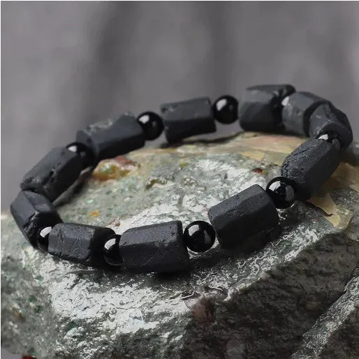 Natural black tourmaline bracelet with Seiko-treated beads approximately 9mm diameter