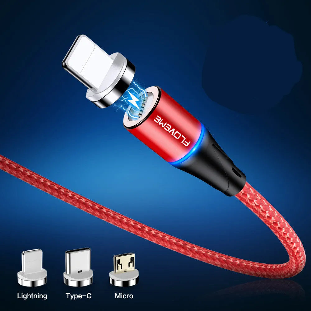 Black magnetic data cable with LED light on connector next to smartphone