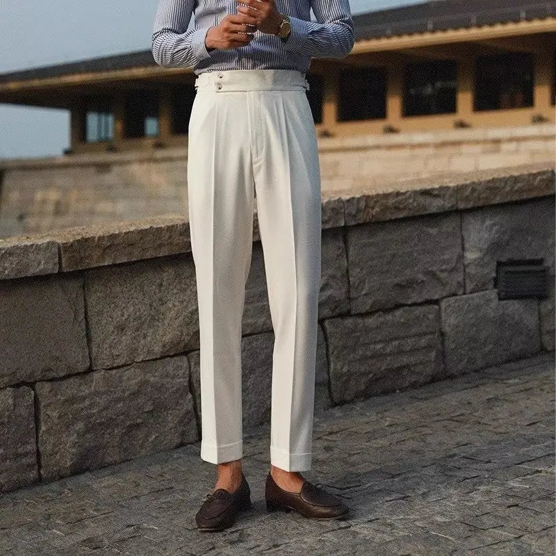 Slim fit straight cut formal suit trousers in apricot, black, and white colours.