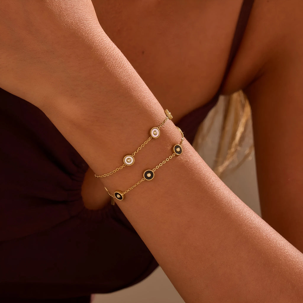 Women's stainless steel bracelet with 18K gold plating and geometric fritillary pattern design