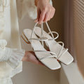 Women's green flat strap Roman sandals with square toe and microfiber upper in Korean style.