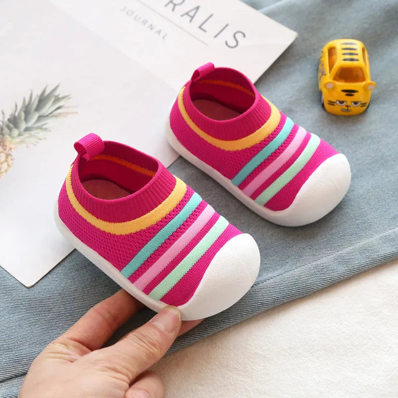 Children's flying knit sock shoes in blue with lace detailing and low-top design