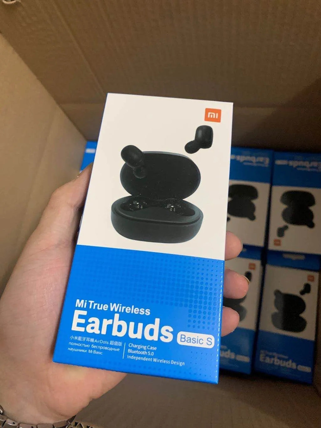 Redmi AirDots Black true wireless Bluetooth earbuds and charging case.