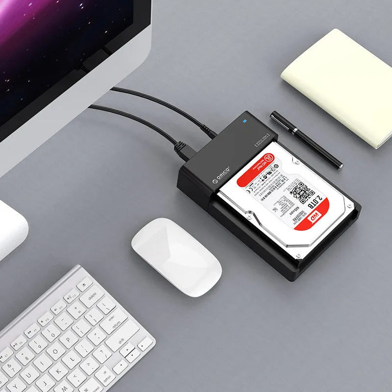 Black plastic hard disk enclosure for 2.5 and 3.5 inch SATA drives with data cable