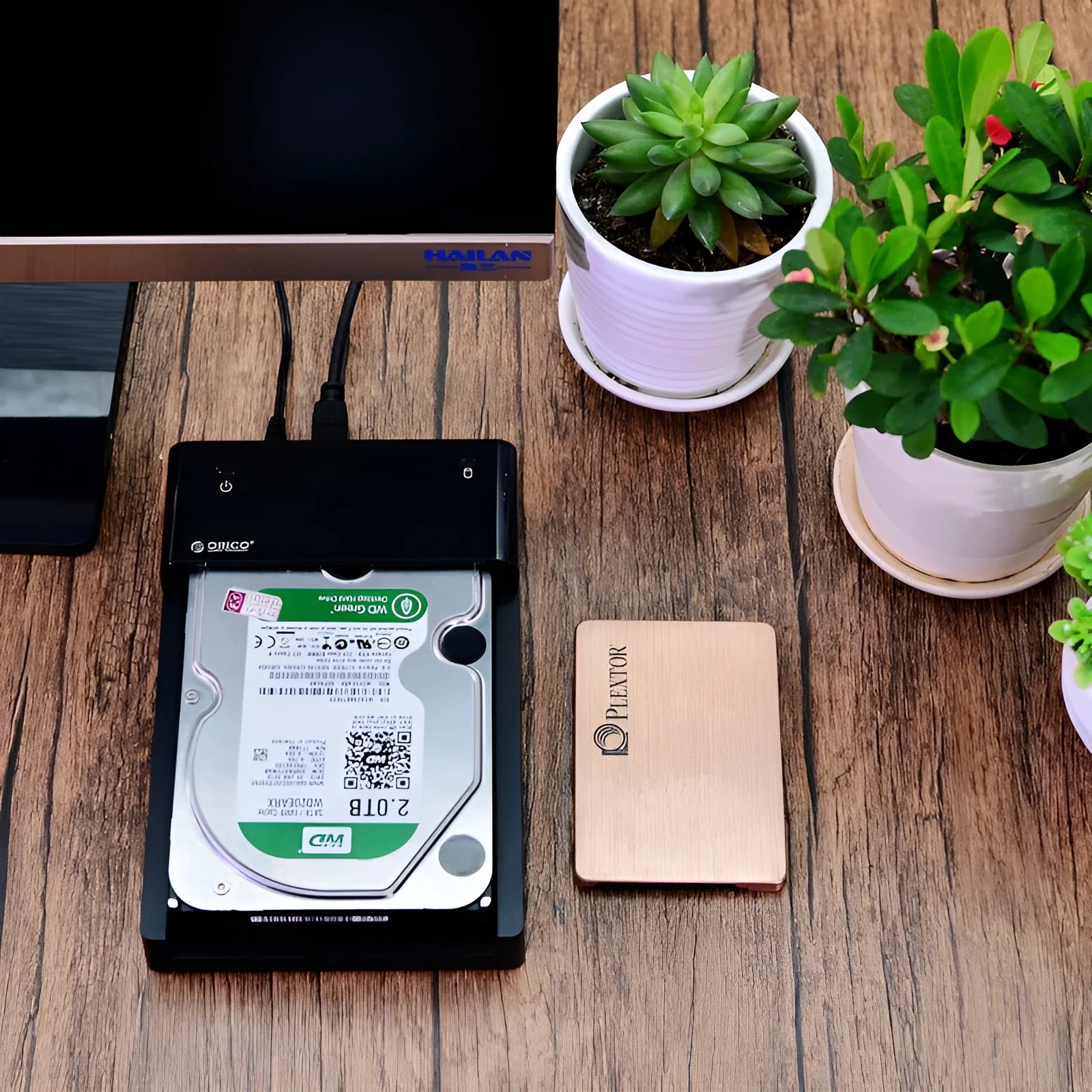 Black plastic hard disk enclosure for 2.5 and 3.5 inch SATA drives with data cable