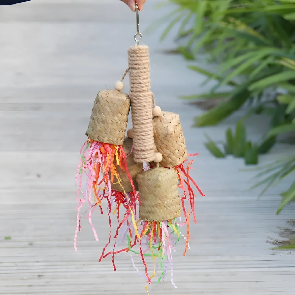 Colourful shredded paper parrot chewing toy with wood and sisal rope construction