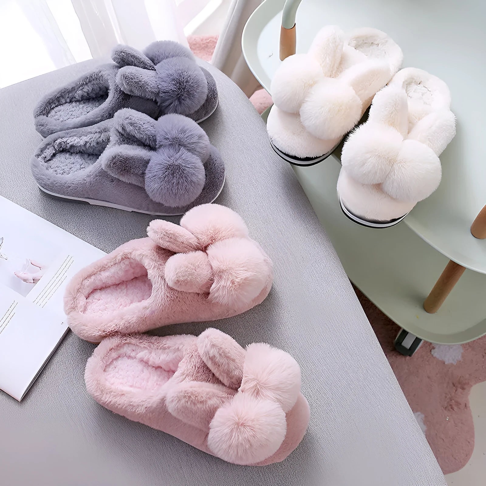 Women's fluffy high-top rabbit fur slippers in cream colour on a wooden floor.