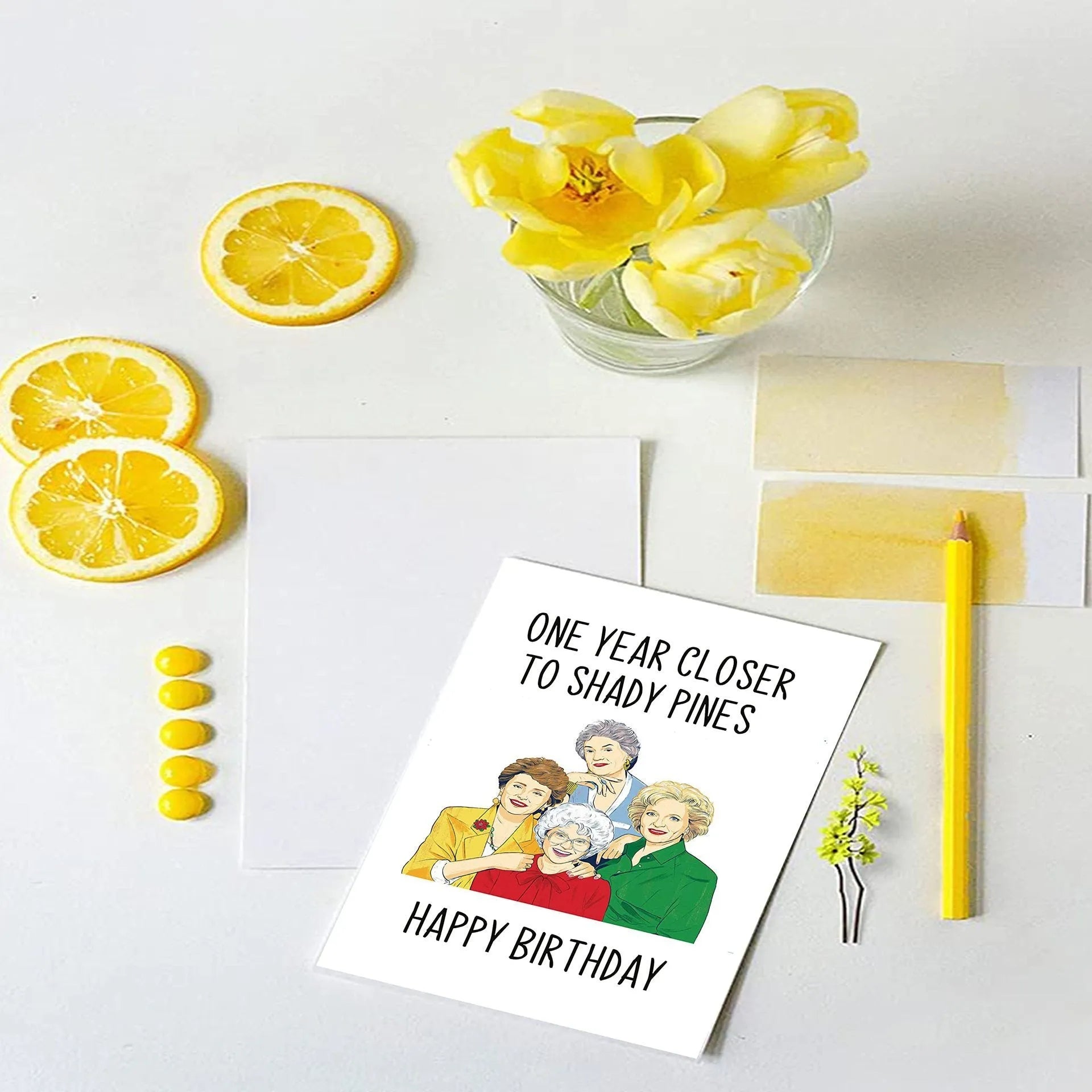 Simple printed birthday greeting card with examples of yellow, purple, pink, red, and kraft paper envelopes.