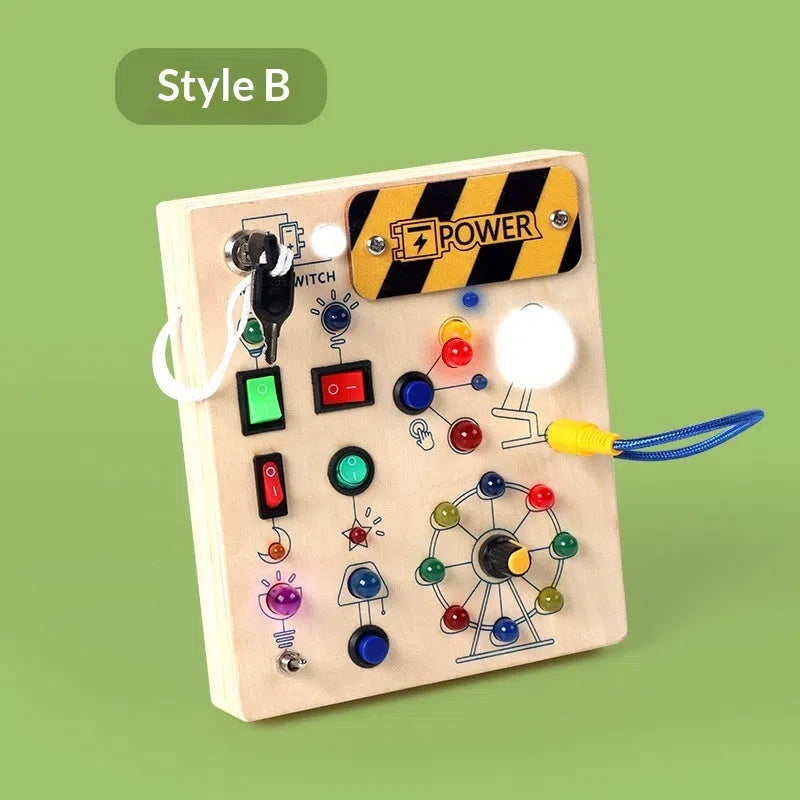 Wooden busy switch light toy on a table, showing switch panel and coloured light section.