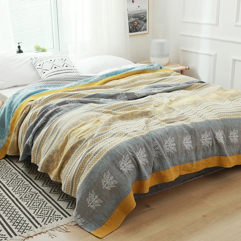 Five-layer gauze cotton bed sheet blanket in Roulette Wheel Blue pattern showing modern simplicity design