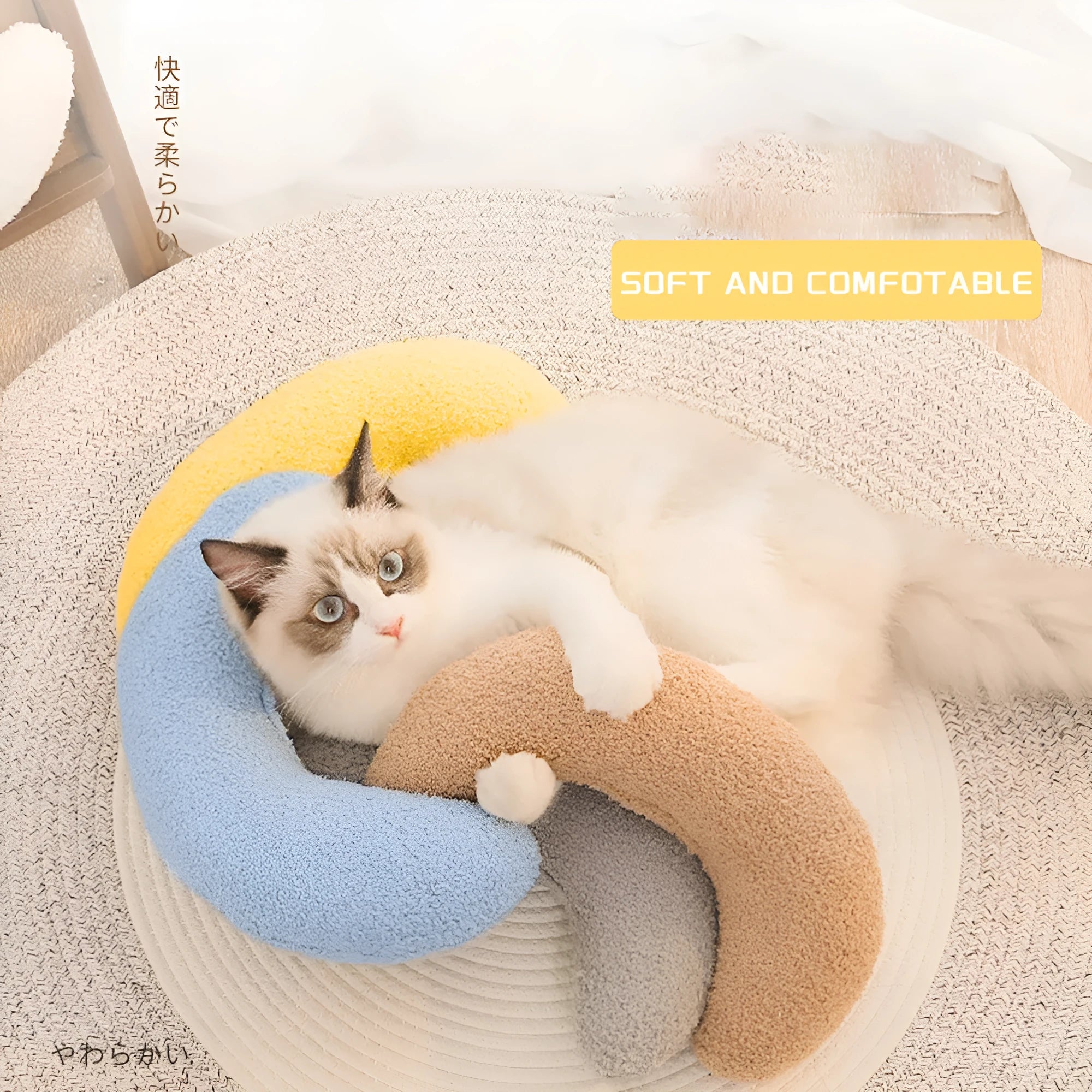 Blue U-shaped cat pillow with adjustable neck collar for ergonomic support