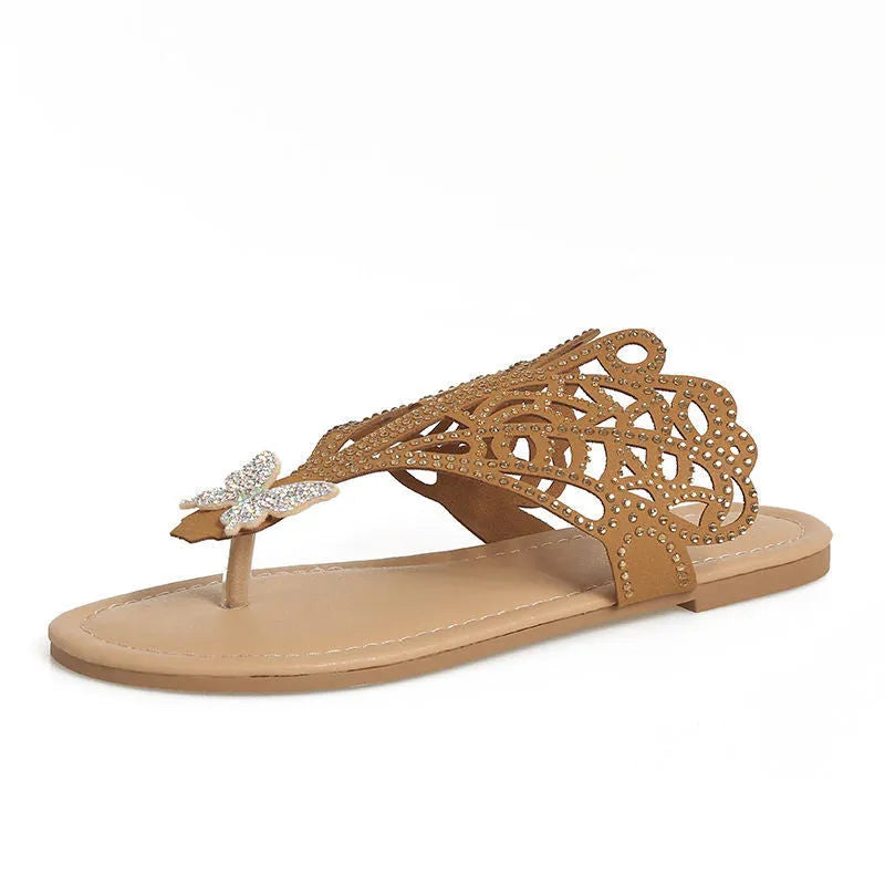 Women's black slip-on sandals with rhinestone decoration and flip-toe design