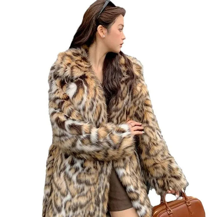 Women's artificial fur coat with collar in street fashion style showing pocket detailing