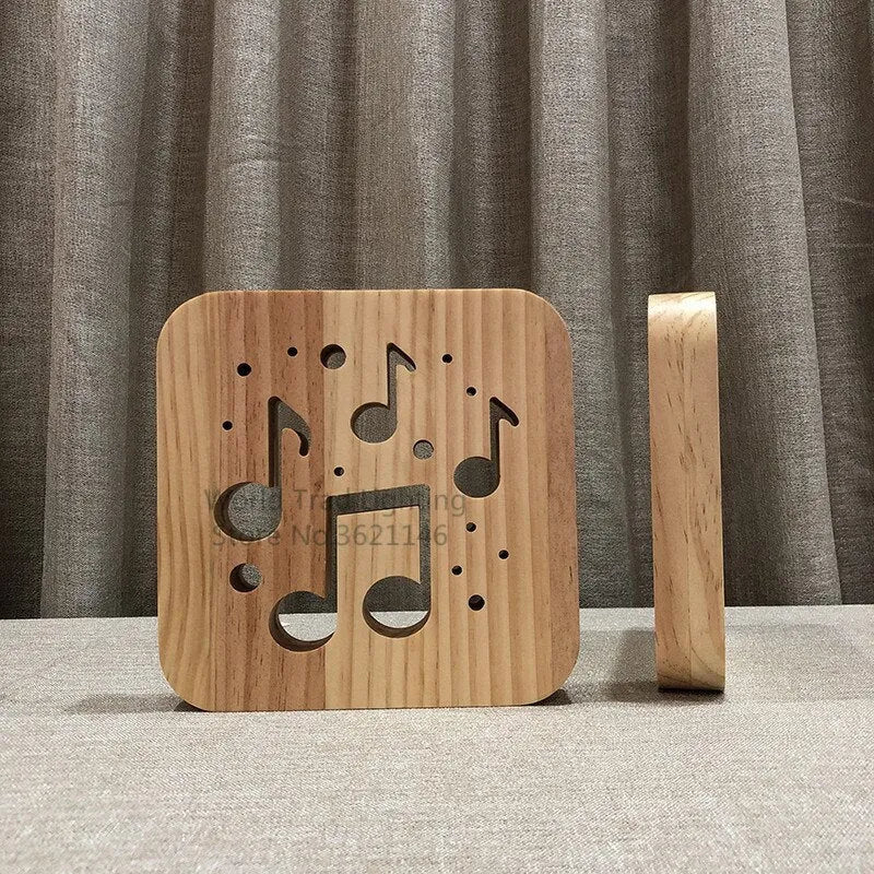 Square pine wood USB LED atmosphere lamp emitting warm white light from its 3D design.