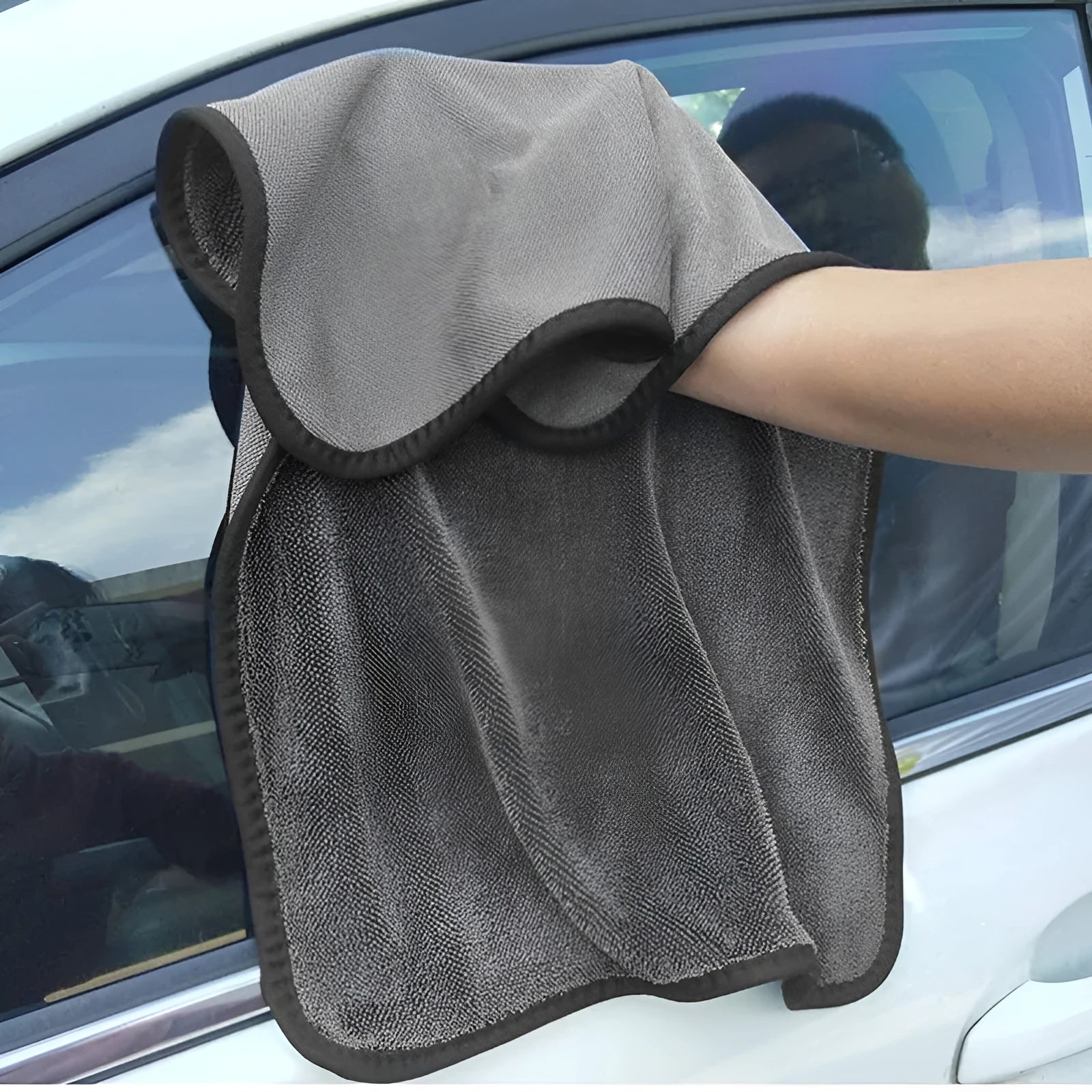 Grey 40cm by 40cm microfiber car drying towel laid flat.