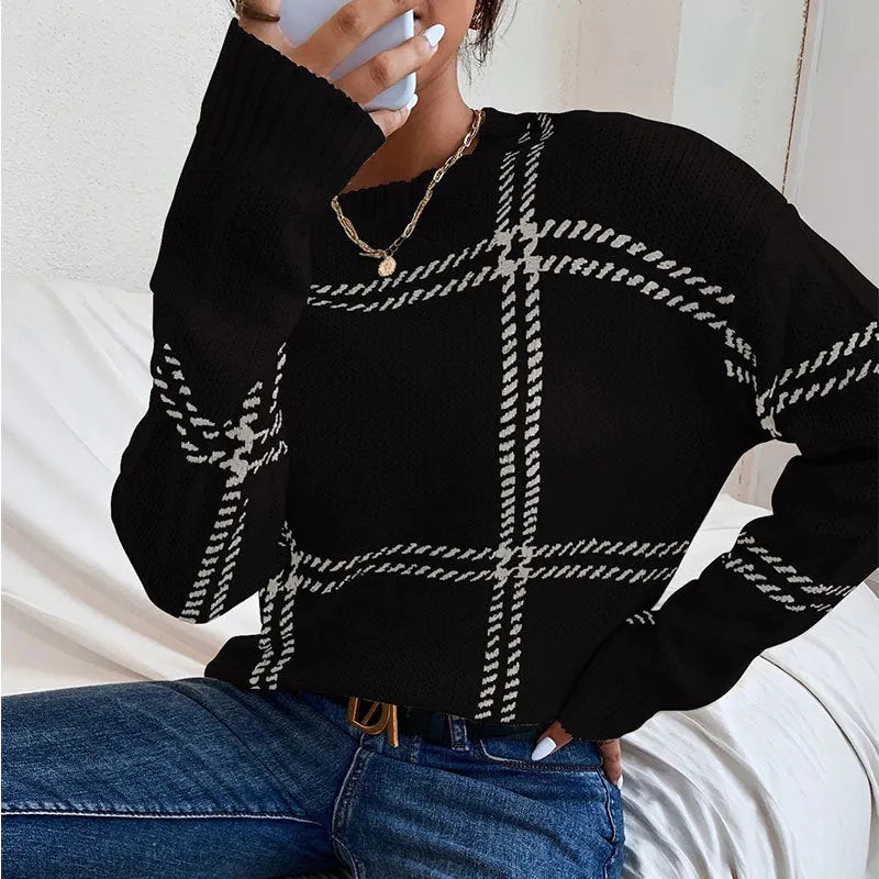 Women's loose fit plaid colour-block acrylic sweater with crew neck in striped apricot, black, beige, red, and green.