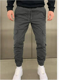 Men's light blue straight-leg baggy casual trousers with patch pockets and an elastic waistband.