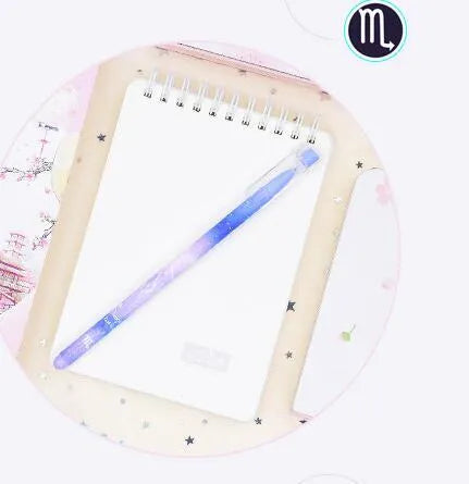 Box of 12 quick-drying gel pens with constellation designs and plastic bodies