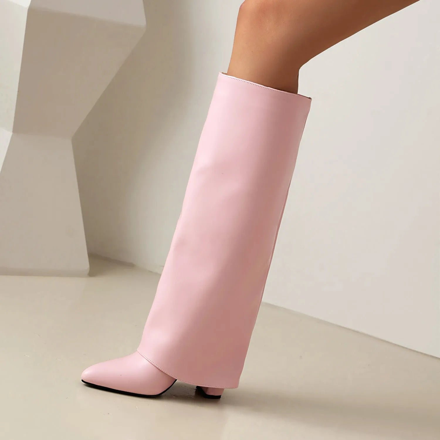 Women's black thick high heel winter boots with decorative stitching and high shaft