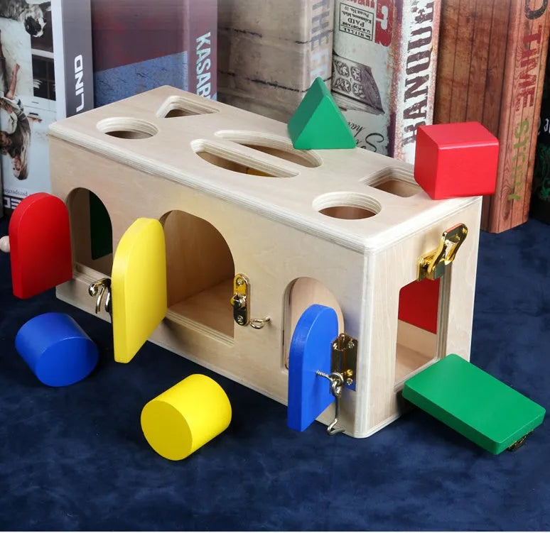 Wooden educational shape sorting lock box toy with coloured blocks for preschool children.
