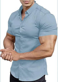 Man wearing a brown short sleeve casual printed shirt with a collar.